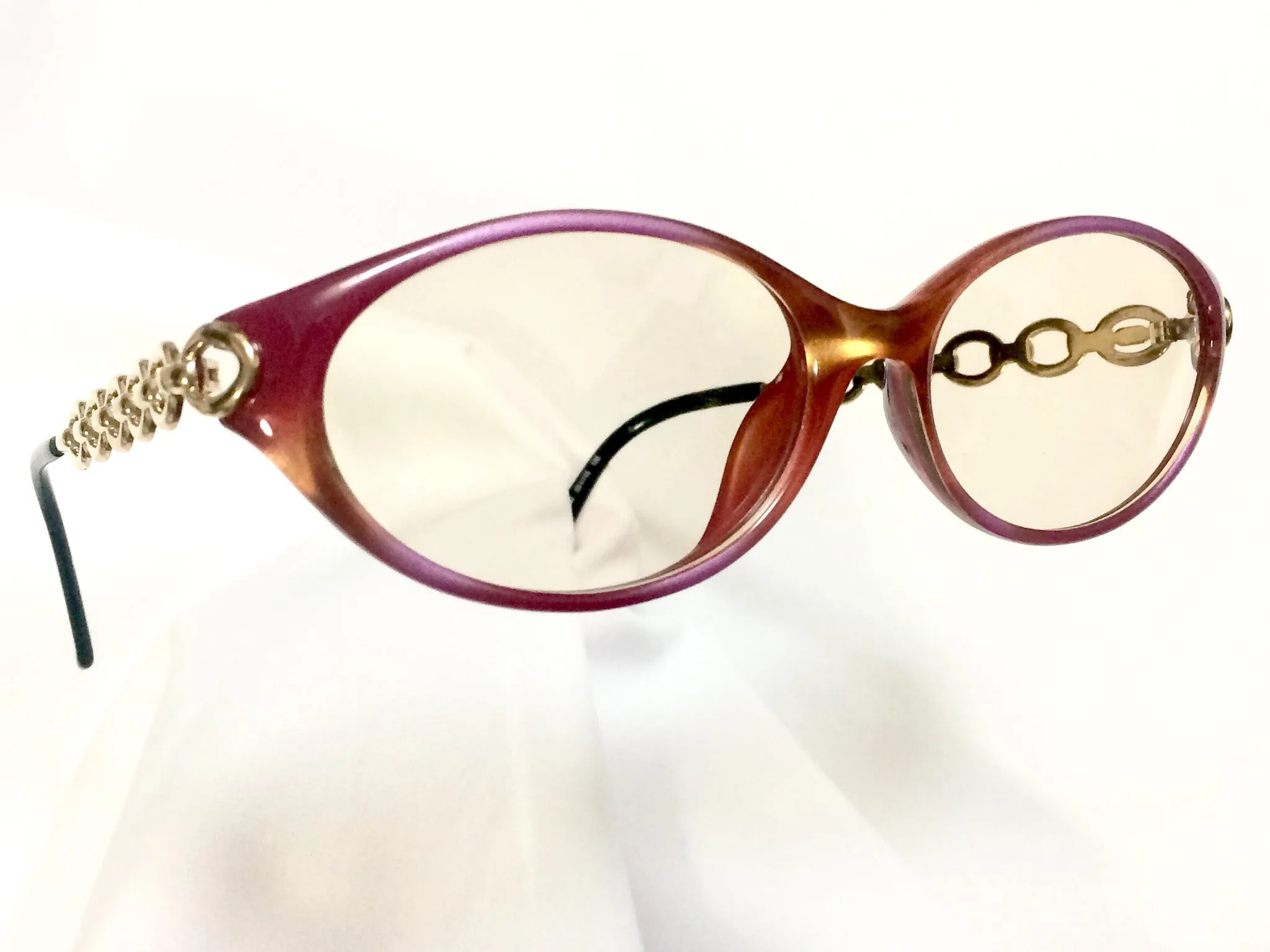 60's, 70's vintage Christian Dior pink and orange gradation sunglasses with golden chain temple. Unique and mod eyewear.