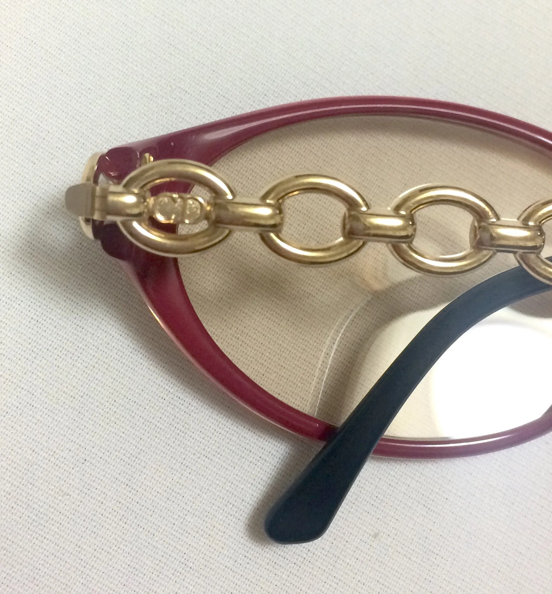 60's, 70's vintage Christian Dior pink and orange gradation sunglasses with golden chain temple. Unique and mod eyewear.