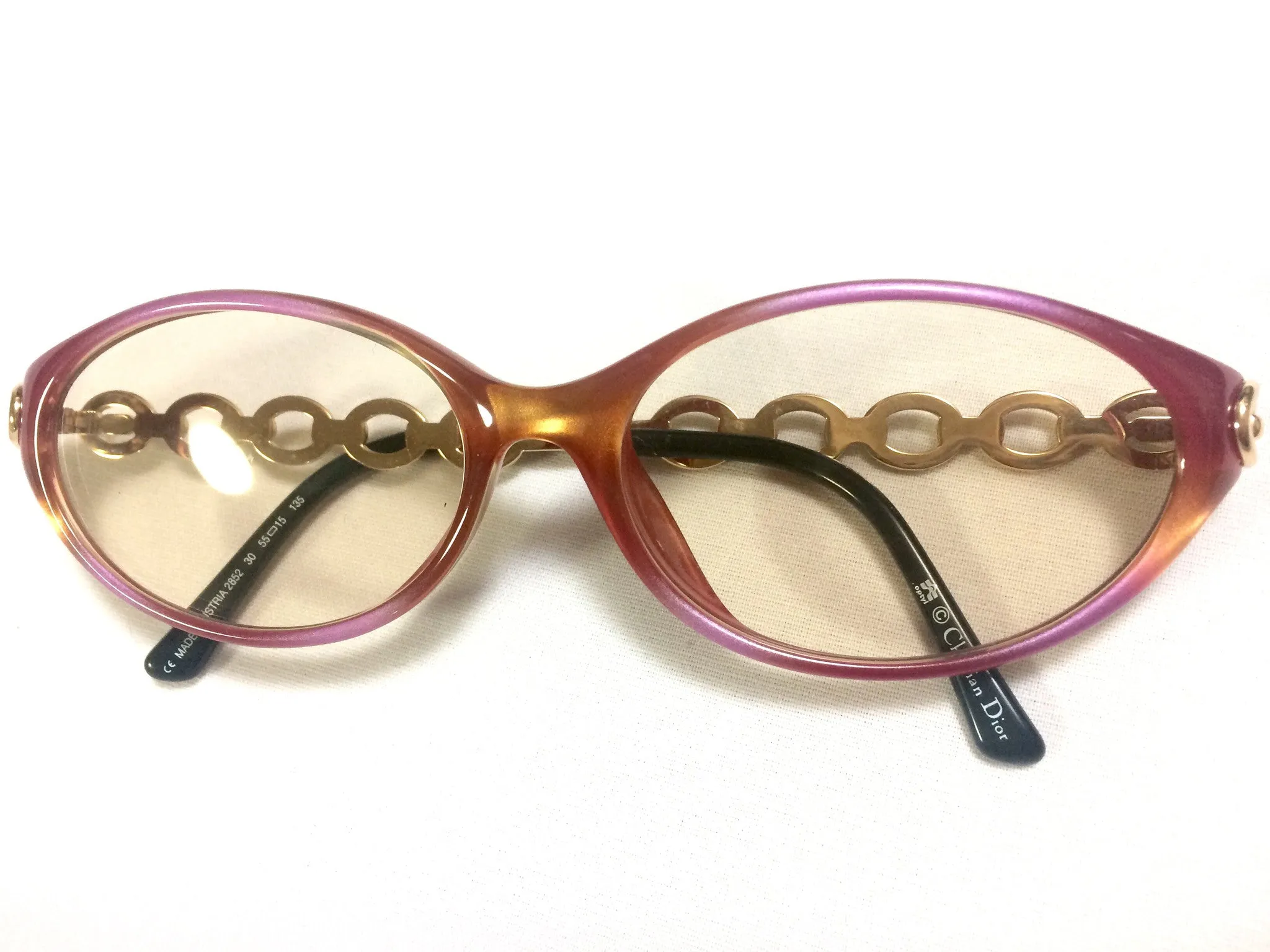 60's, 70's vintage Christian Dior pink and orange gradation sunglasses with golden chain temple. Unique and mod eyewear.