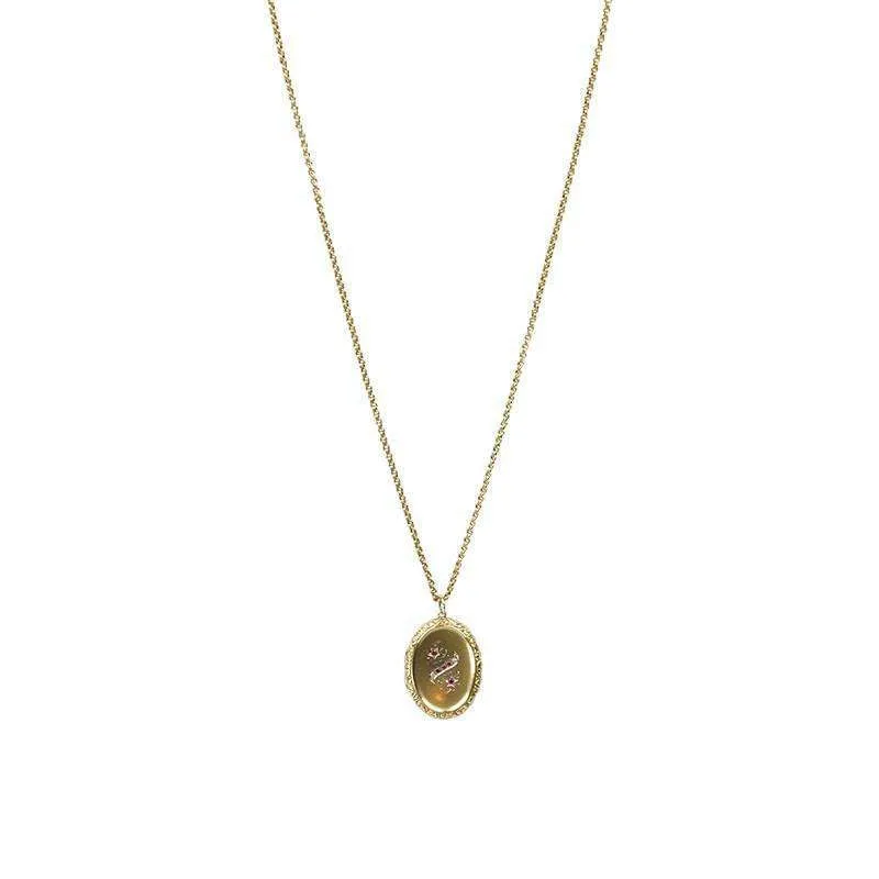 Graceful Gem Set Vintage Gold Locket on a Long Chain