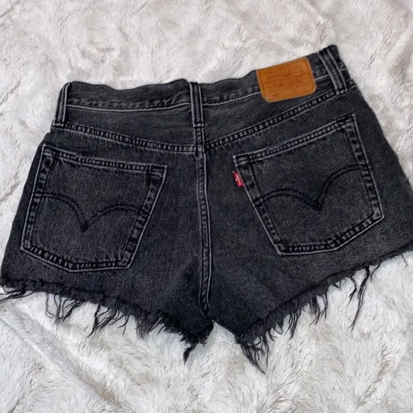 Levi’s 501  distressed black shorts in excellent preowned condition size 27
