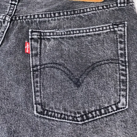 Levi’s 501  distressed black shorts in excellent preowned condition size 27