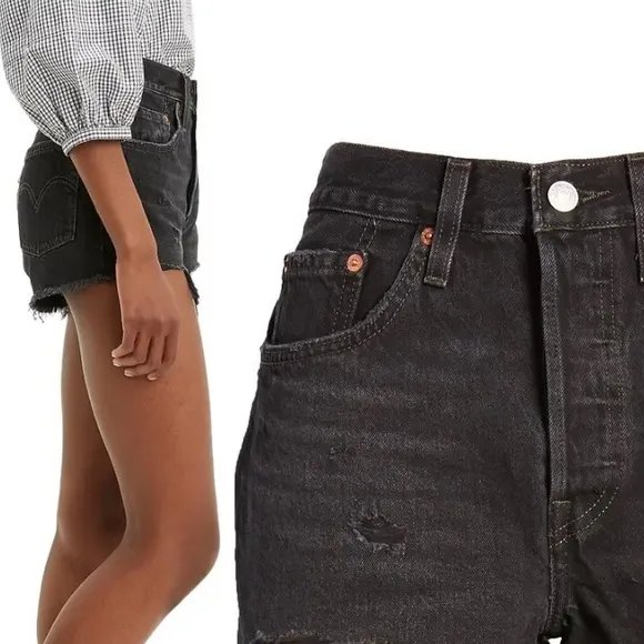 Levi’s 501  distressed black shorts in excellent preowned condition size 27