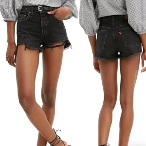 Levi’s 501  distressed black shorts in excellent preowned condition size 27