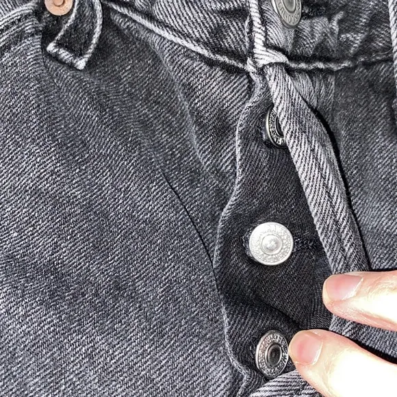 Levi’s 501  distressed black shorts in excellent preowned condition size 27