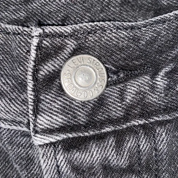 Levi’s 501  distressed black shorts in excellent preowned condition size 27