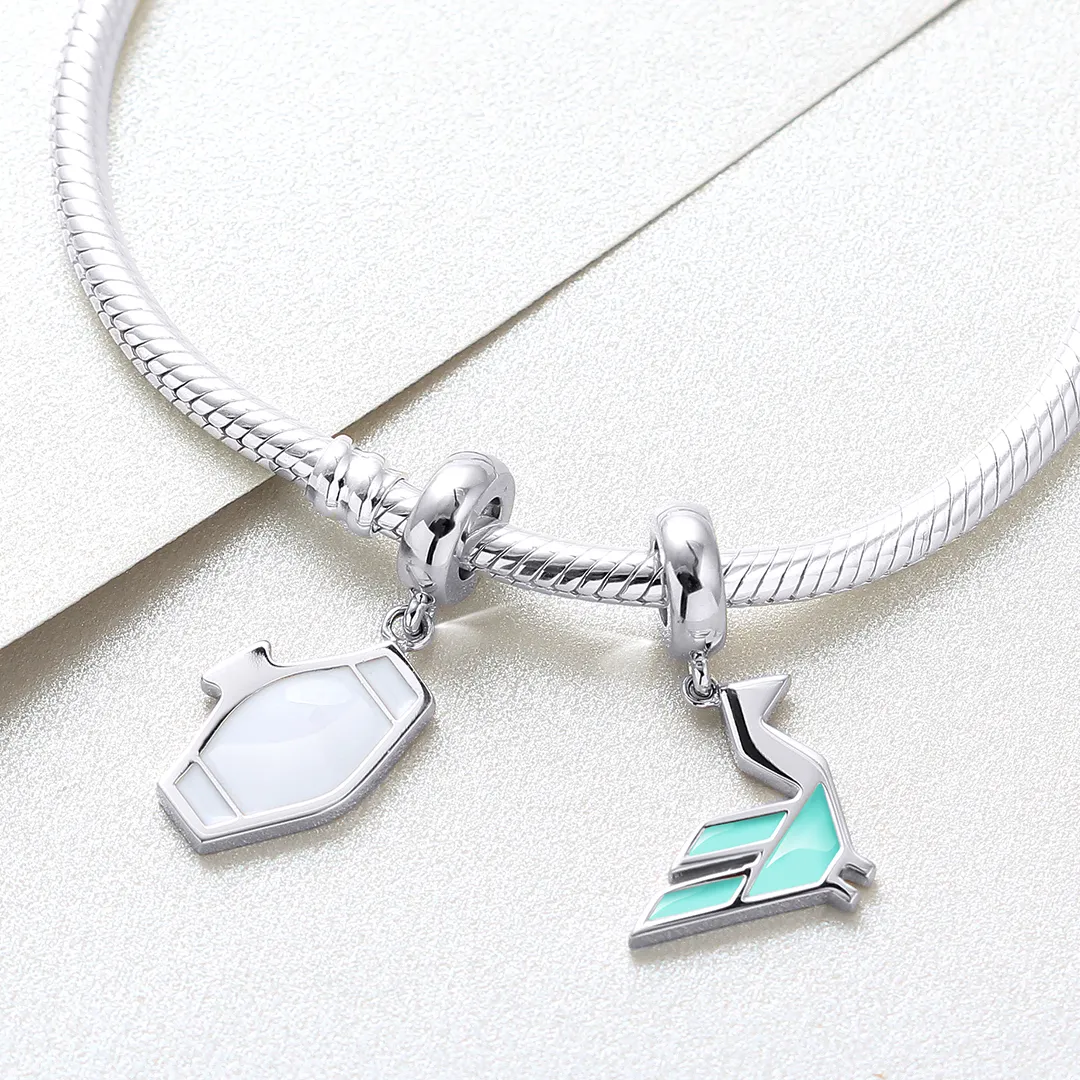 Turquoises Carpet's Bird Charm